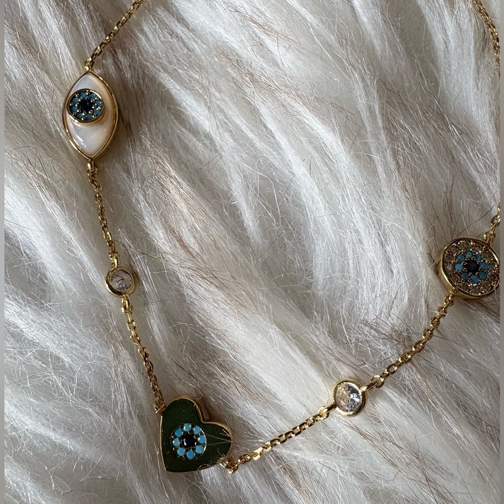 Kate Spade Gold Eye and Blue Heart Bracelet with Crystal Details